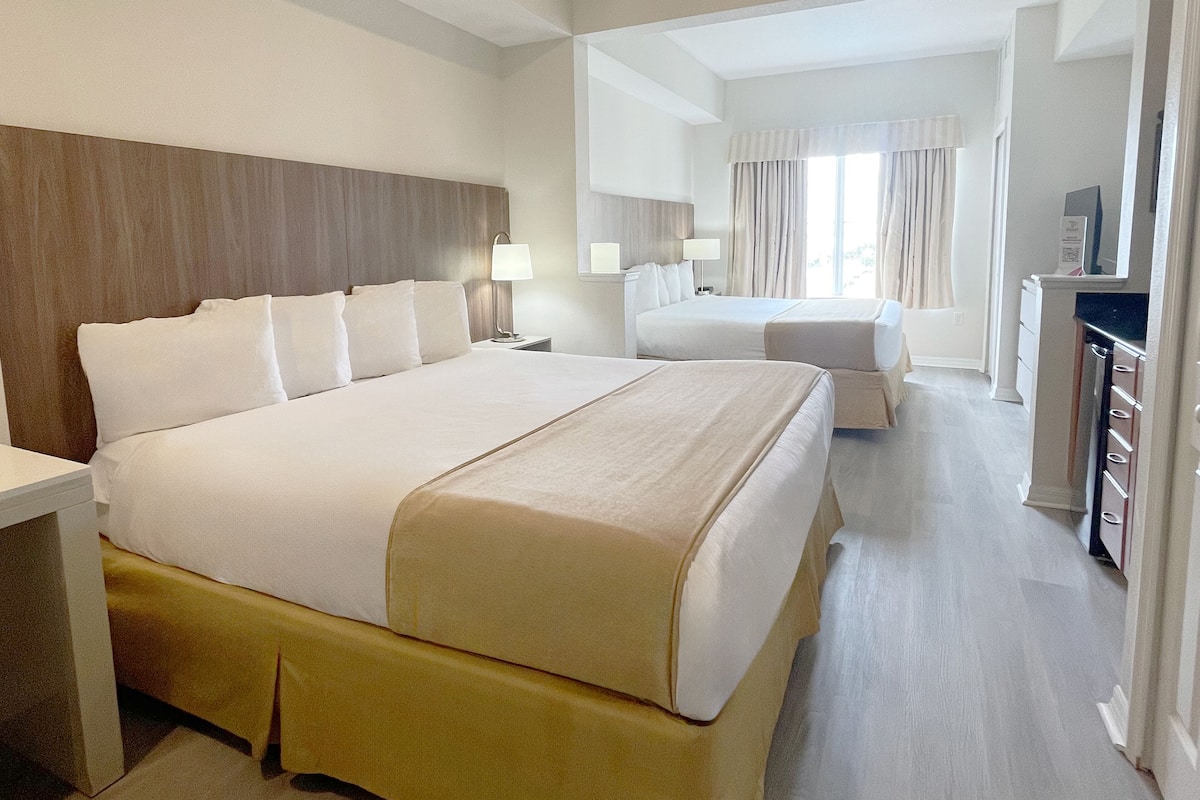 King Room with 2 King Beds | Minibar, in-room safe, desk, blackout drapes