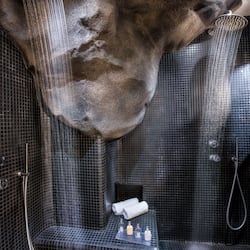 Junior Cave Suite | Bathroom | Shower, designer toiletries, hair dryer, bathrobes