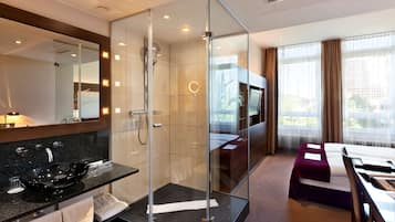 Designer toiletries, hair dryer, towels, soap