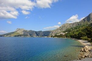 Beach cabanas, sun loungers, beach umbrellas, beach towels