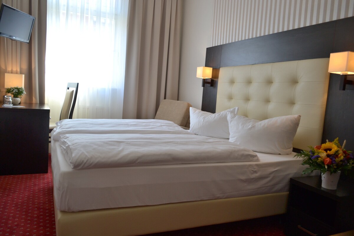 Blackout drapes, iron/ironing board (on request), WiFi (free)