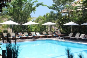 Outdoor pool, pool umbrellas, pool loungers