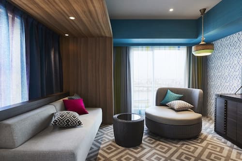 Deluxe kamer, niet-roken, hoek (Carib) | Een kluis op de kamer, verduisterende gordijnen