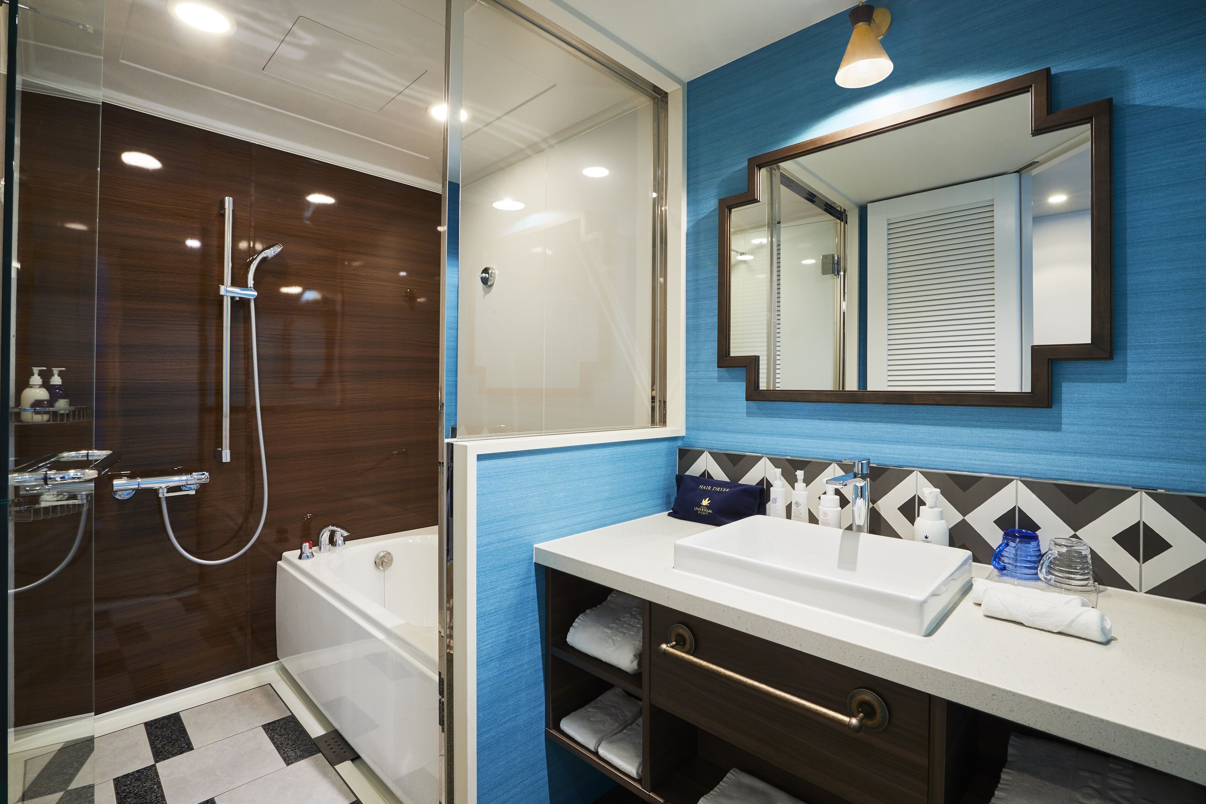 separate bathtub and shower, free toiletries, hair dryer, slippers