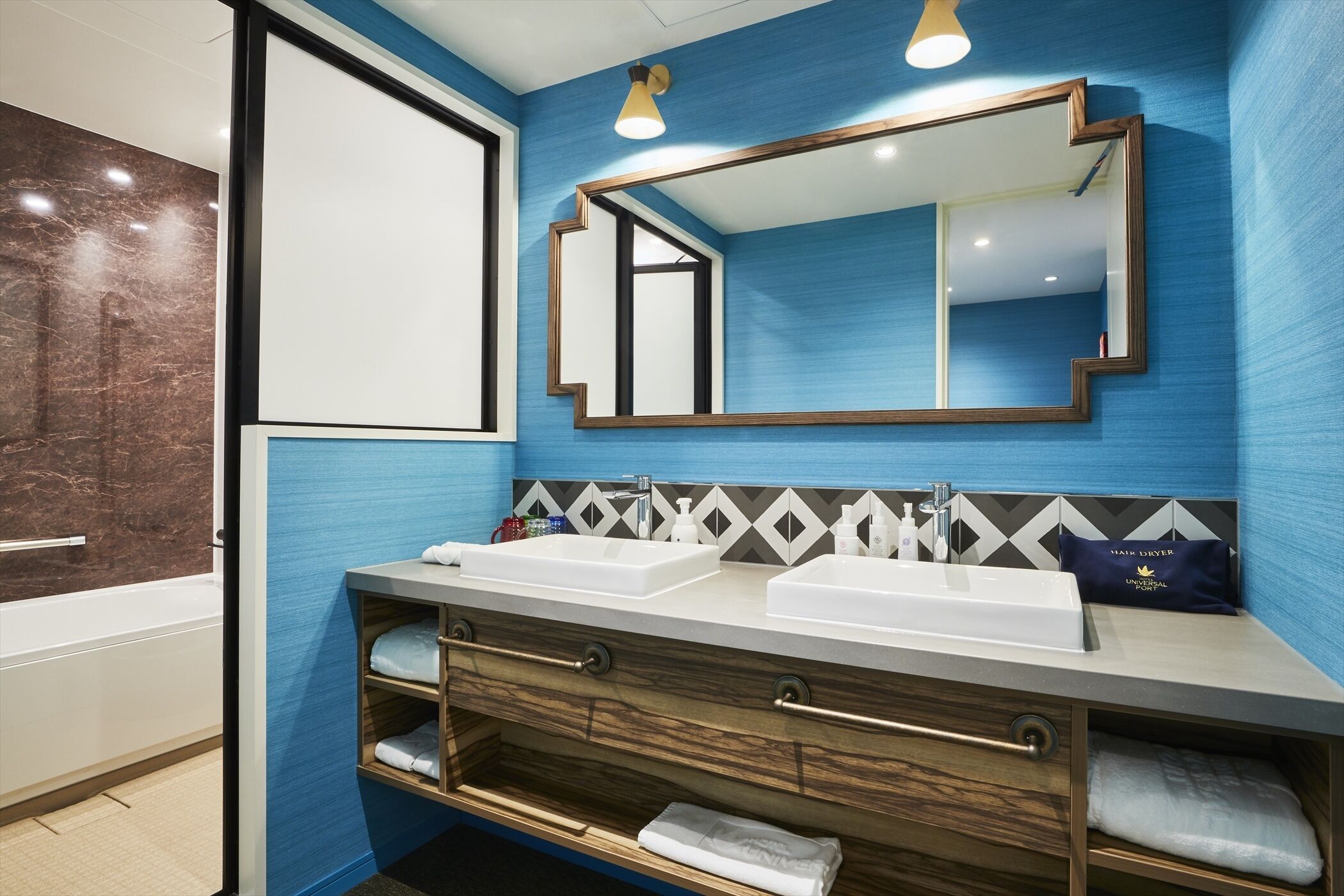 separate bathtub and shower, free toiletries, hair dryer, slippers