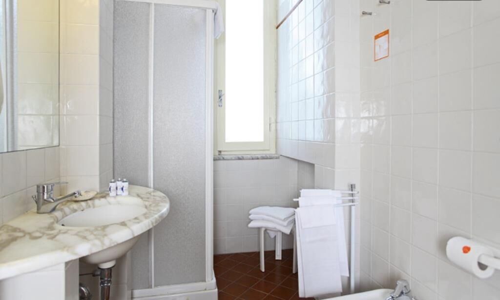 standard double room | bathroom | designer toiletries, hair dryer, bidet, towels