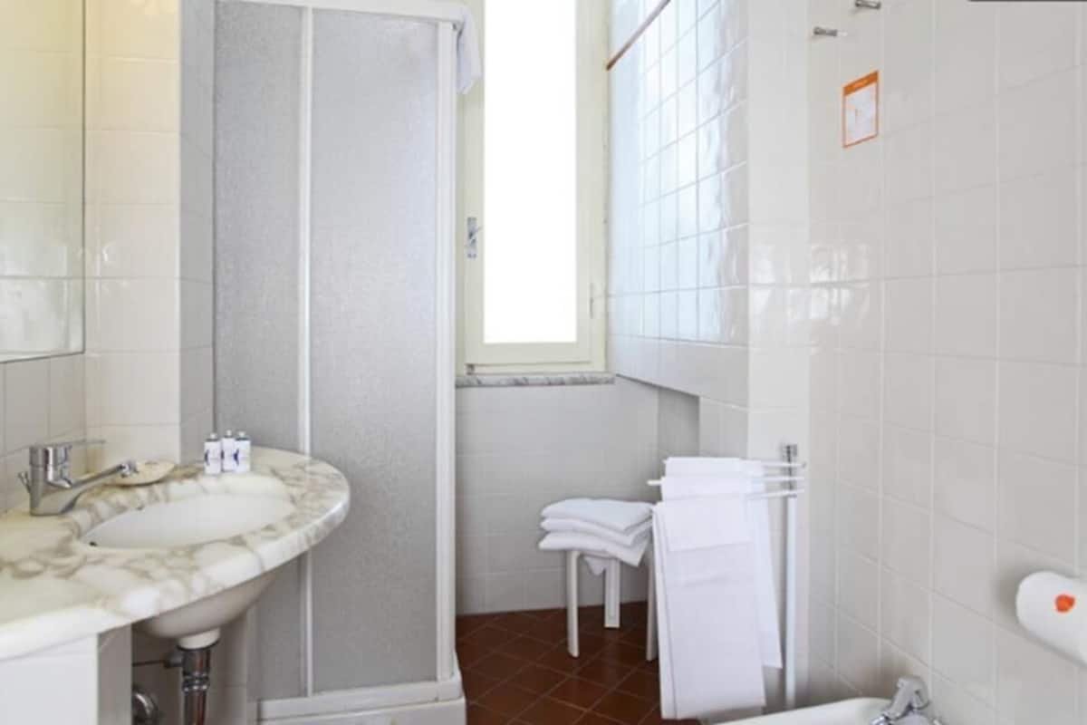 standard double room | bathroom | designer toiletries, hair dryer, bidet, towels