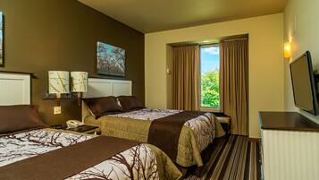 Suíte, 1 quarto | Escrivaninha, acesso grátis à internet com fio, roupa de cama