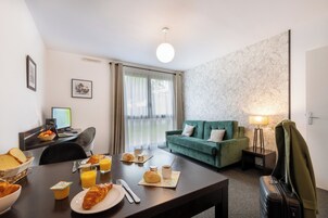 Apartment, 1 Bedroom | Living area | TV, pay movies