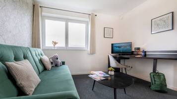 Appartement, 1 slaapkamer | Woonruimte | Televisie en betaalfilms