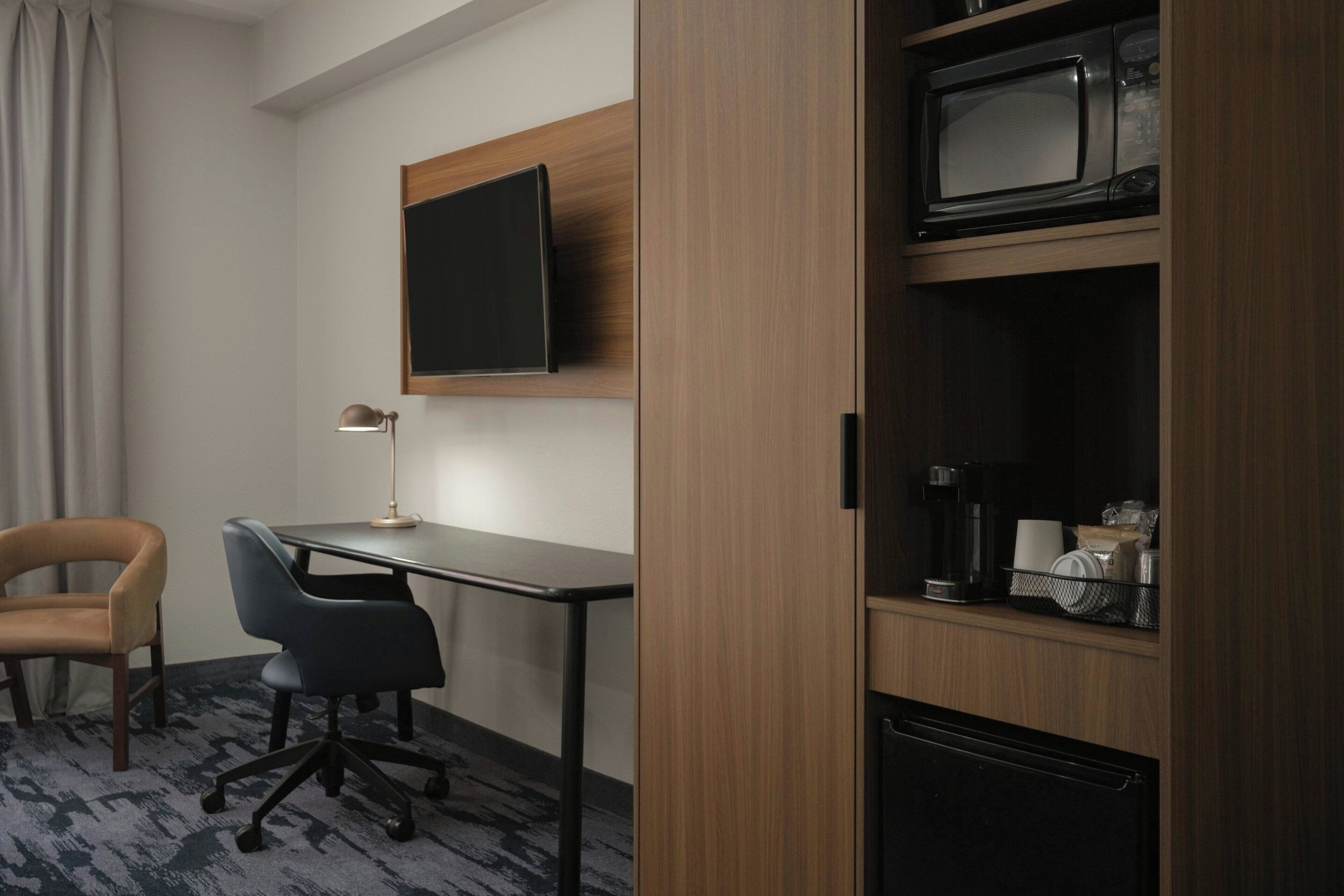 pillow-top beds, desk, blackout curtains, iron/ironing board