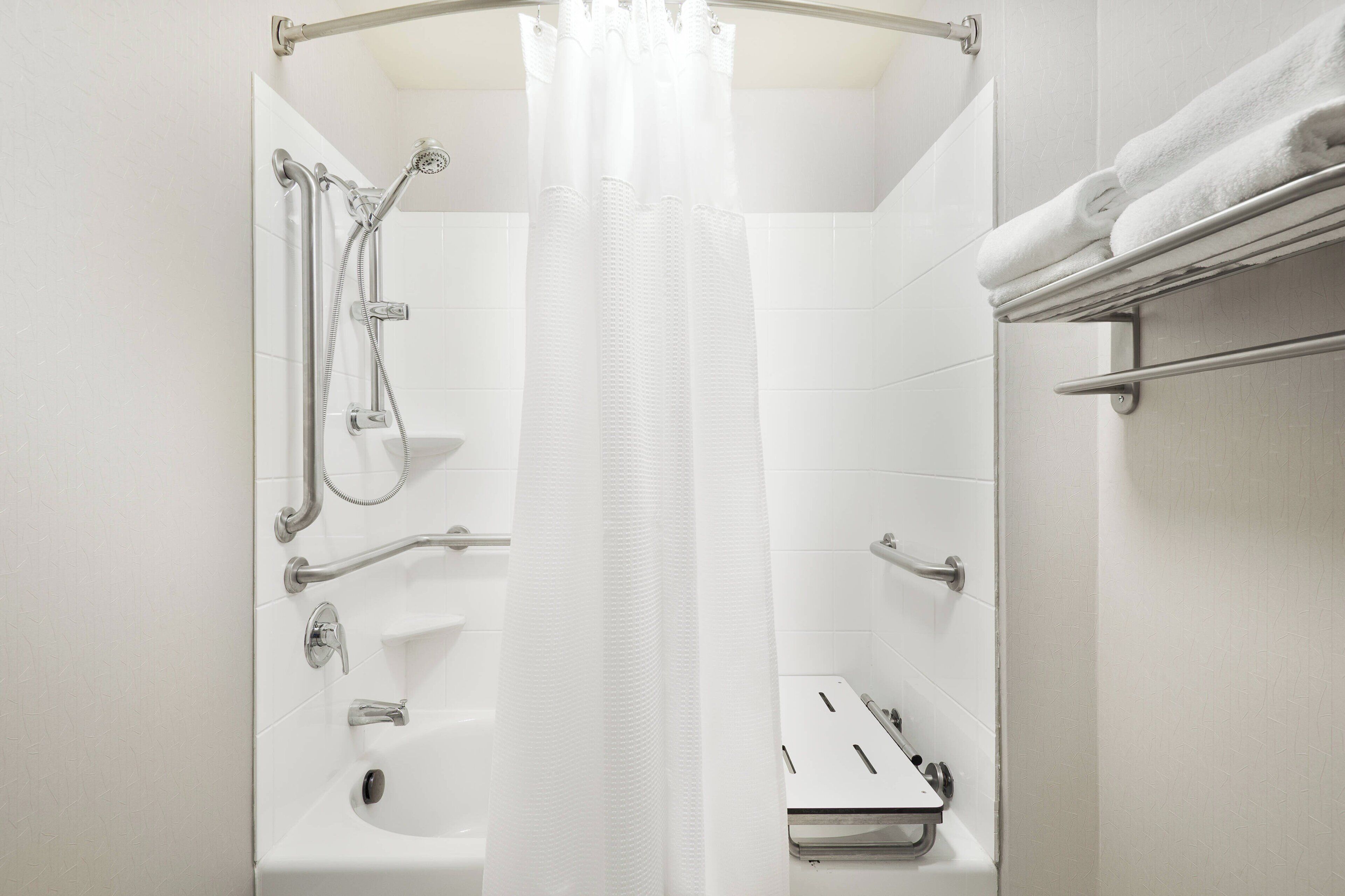 combined shower/bathtub, free toiletries, hair dryer, towels