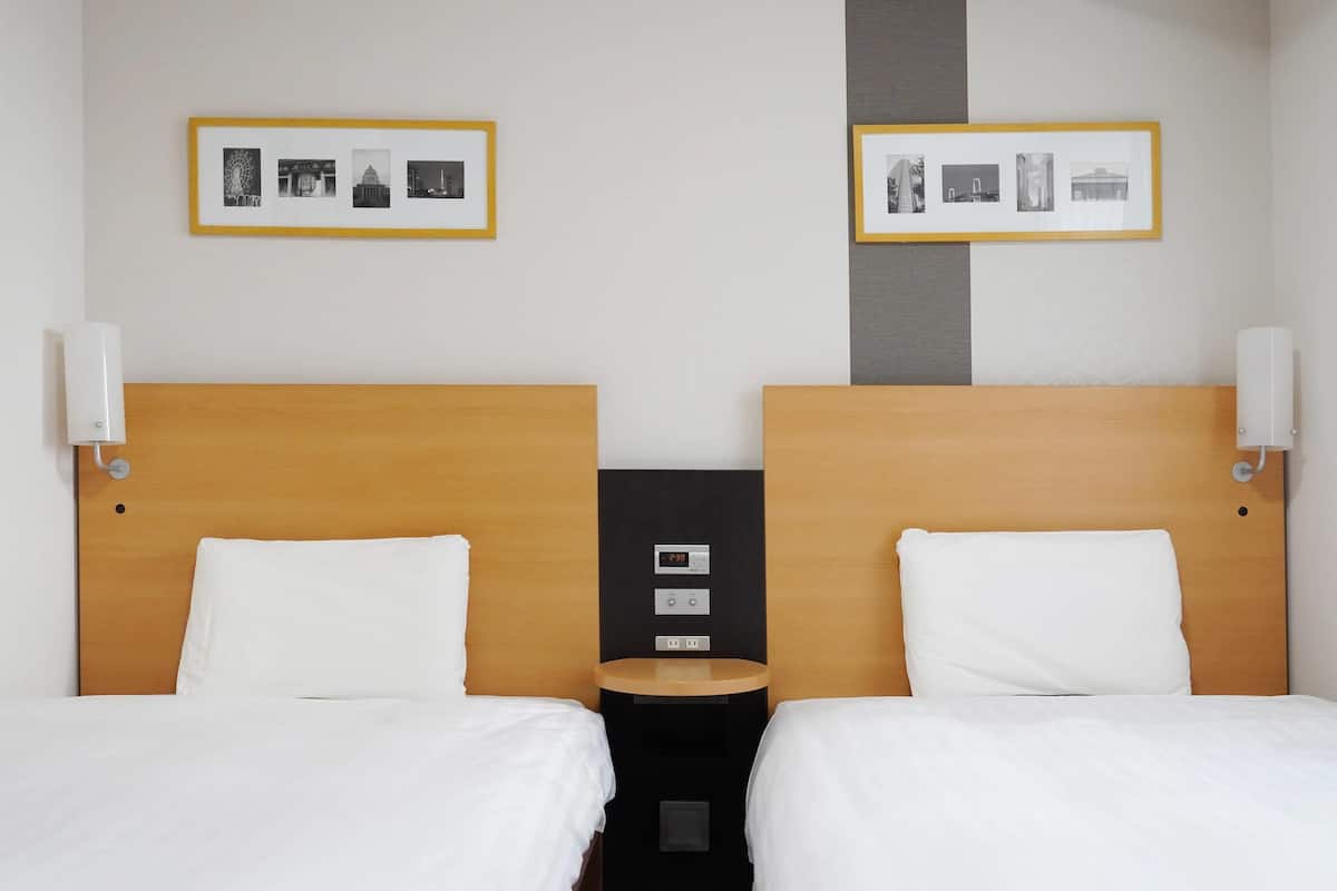 Chambre, 2 lits jumeaux, non-fumeur | Literie de qualité, bureau, espace de travail pour ordinateurs portables