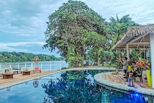 Outdoor pool, open 8:00 AM to 7:00 PM, pool umbrellas, sun loungers