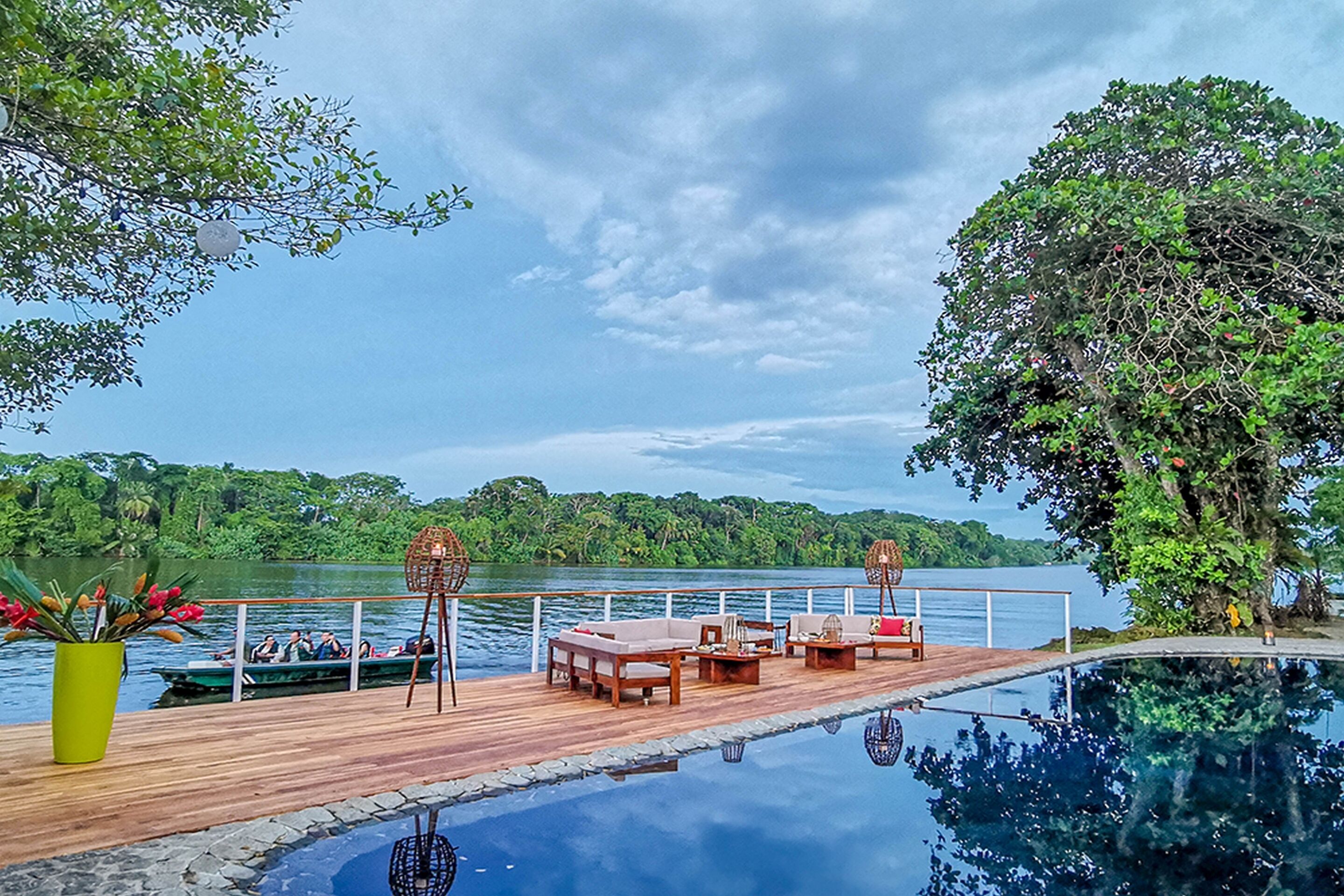 outdoor pool, open 8:00 am to 7:00 pm, pool umbrellas, pool loungers