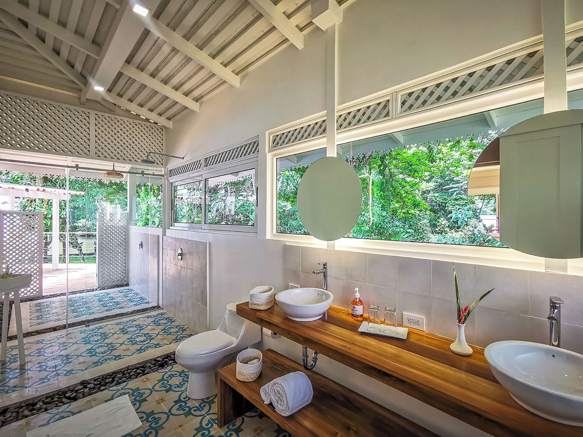 miss florentina villa | bathroom | shower, rainfall showerhead, eco-friendly toiletries, hair dryer