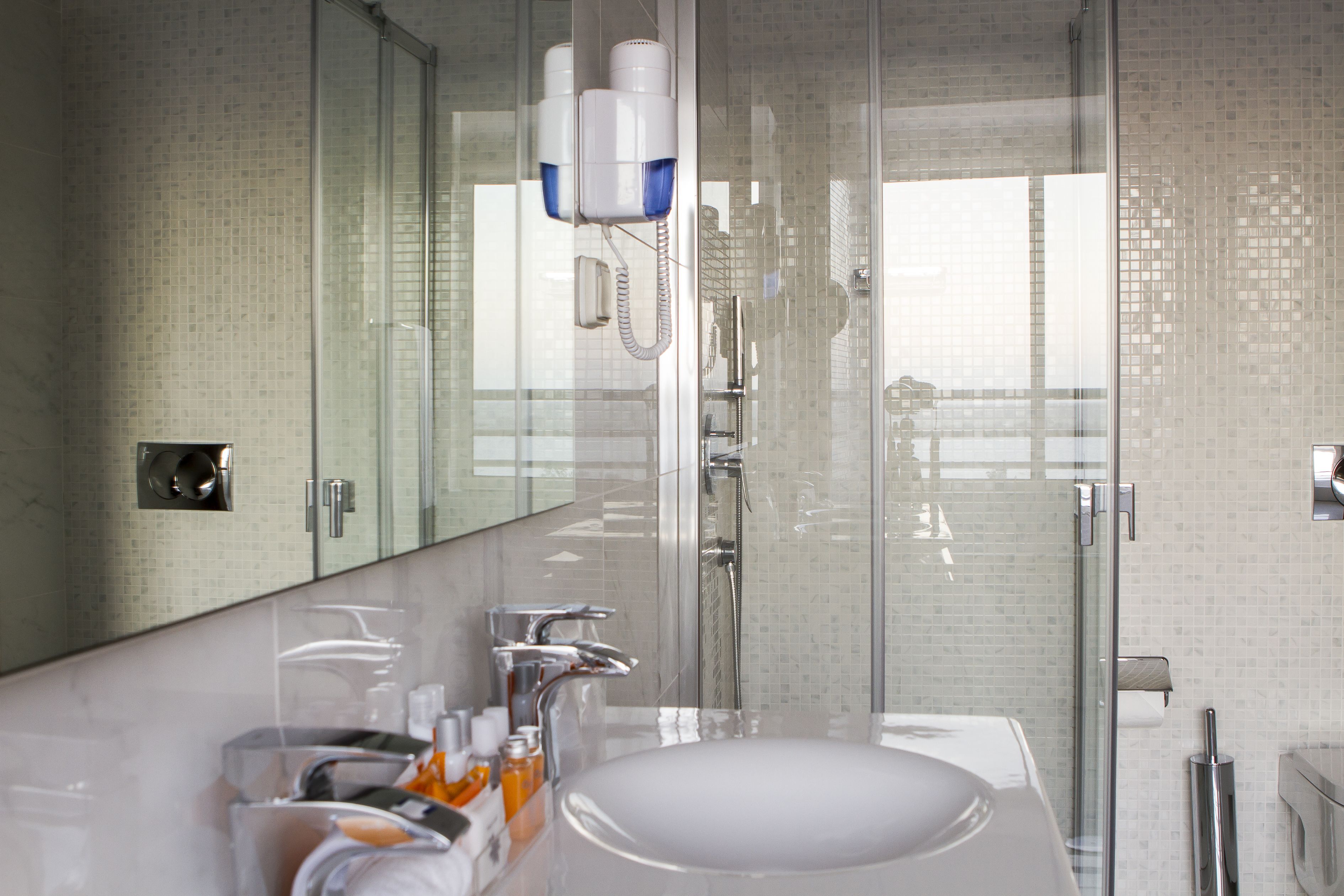 standard room | bathroom | shower, free toiletries, hair dryer, bathrobes