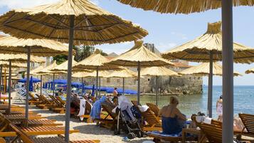 Private beach, sun loungers, beach umbrellas, beach towels