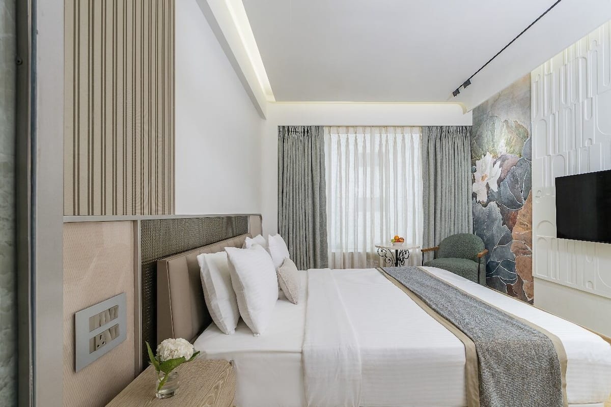 Habitación Club | Ropa de cama de alta calidad y minibar