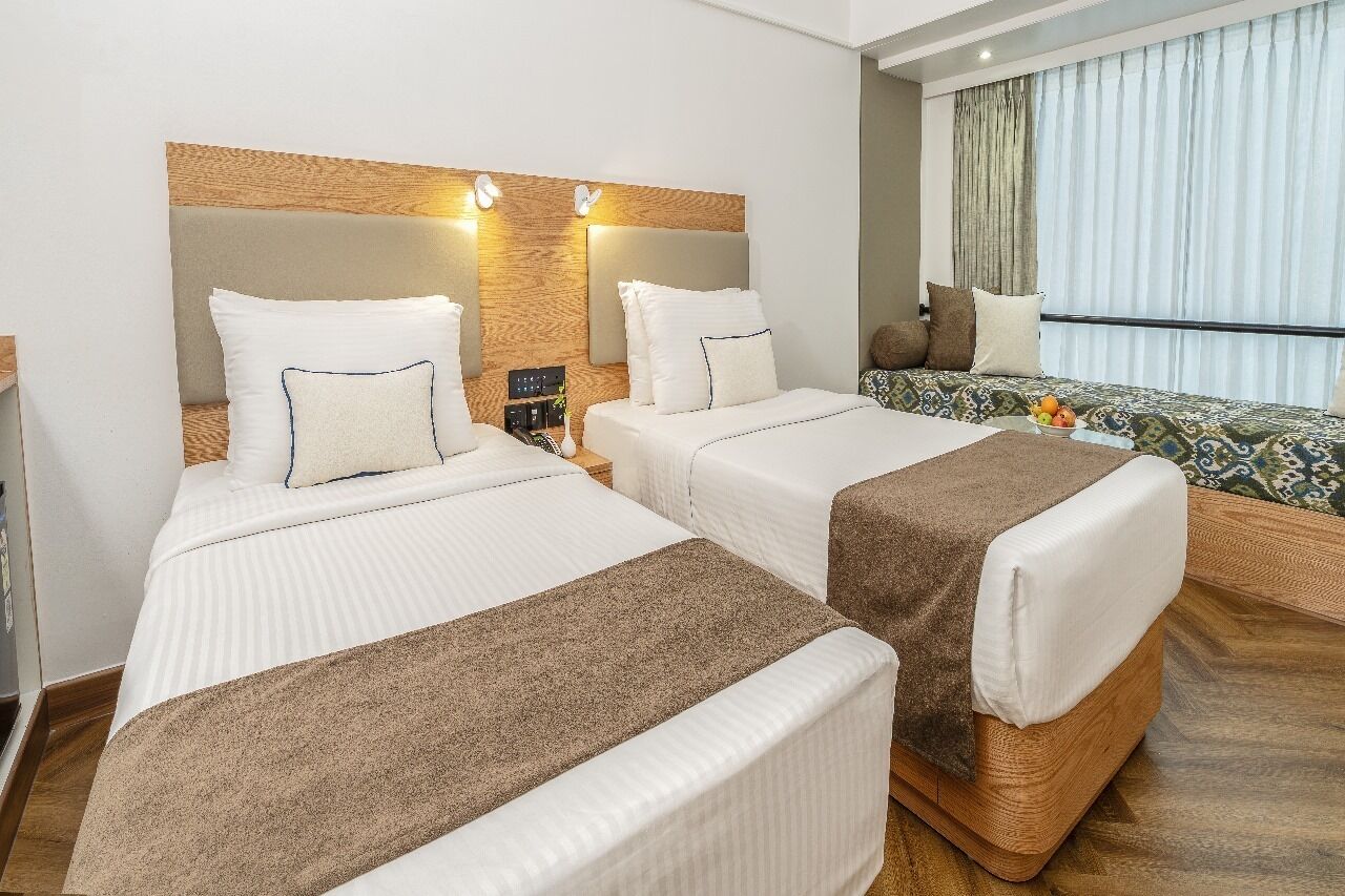 Habitación superior con 2 camas individuales | Ropa de cama de alta calidad, minibar, caja fuerte y escritorio