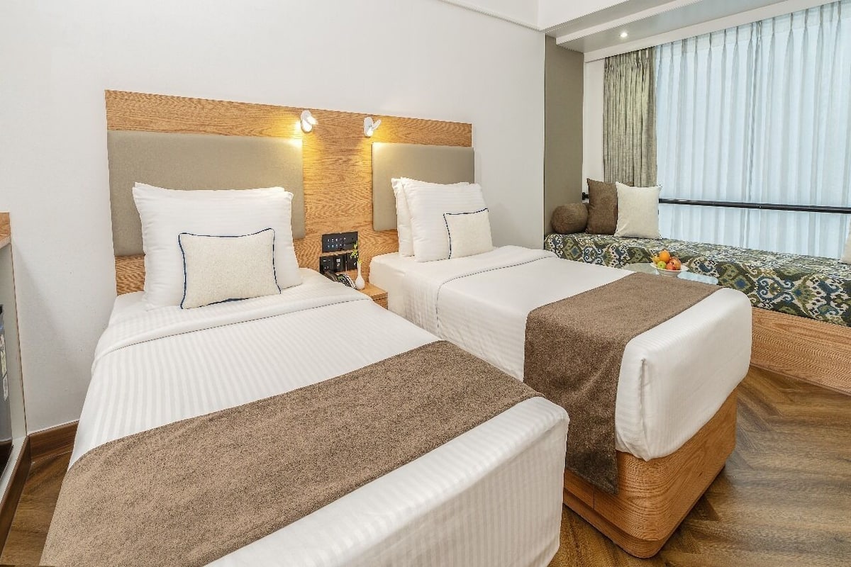 Habitación superior con 2 camas individuales | Ropa de cama de alta calidad y minibar