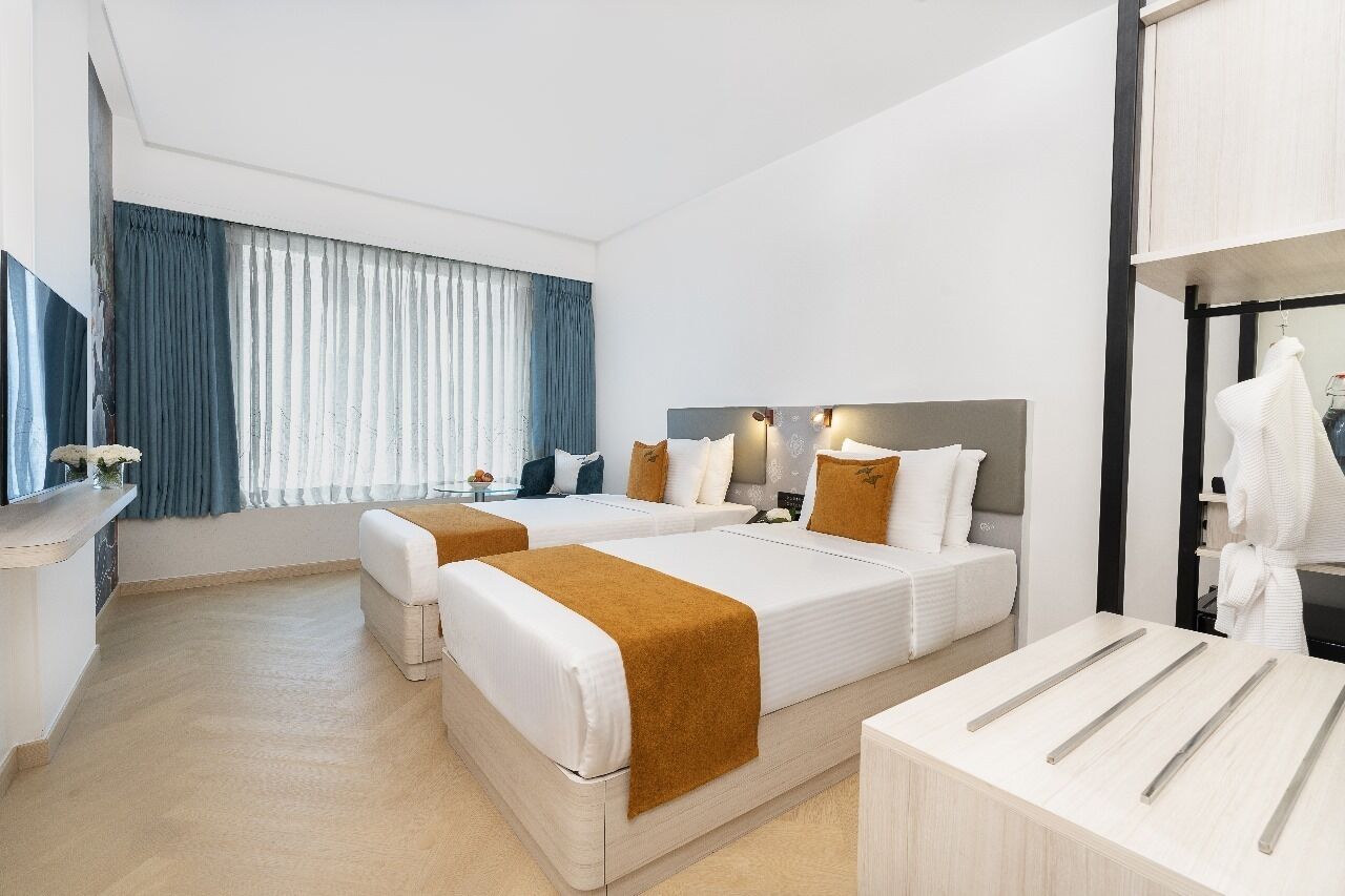 Habitación Premium con 2 camas individuales | Ropa de cama de alta calidad, minibar, caja fuerte y escritorio