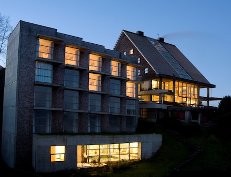 Front of property - evening/night. Hotel de Castro