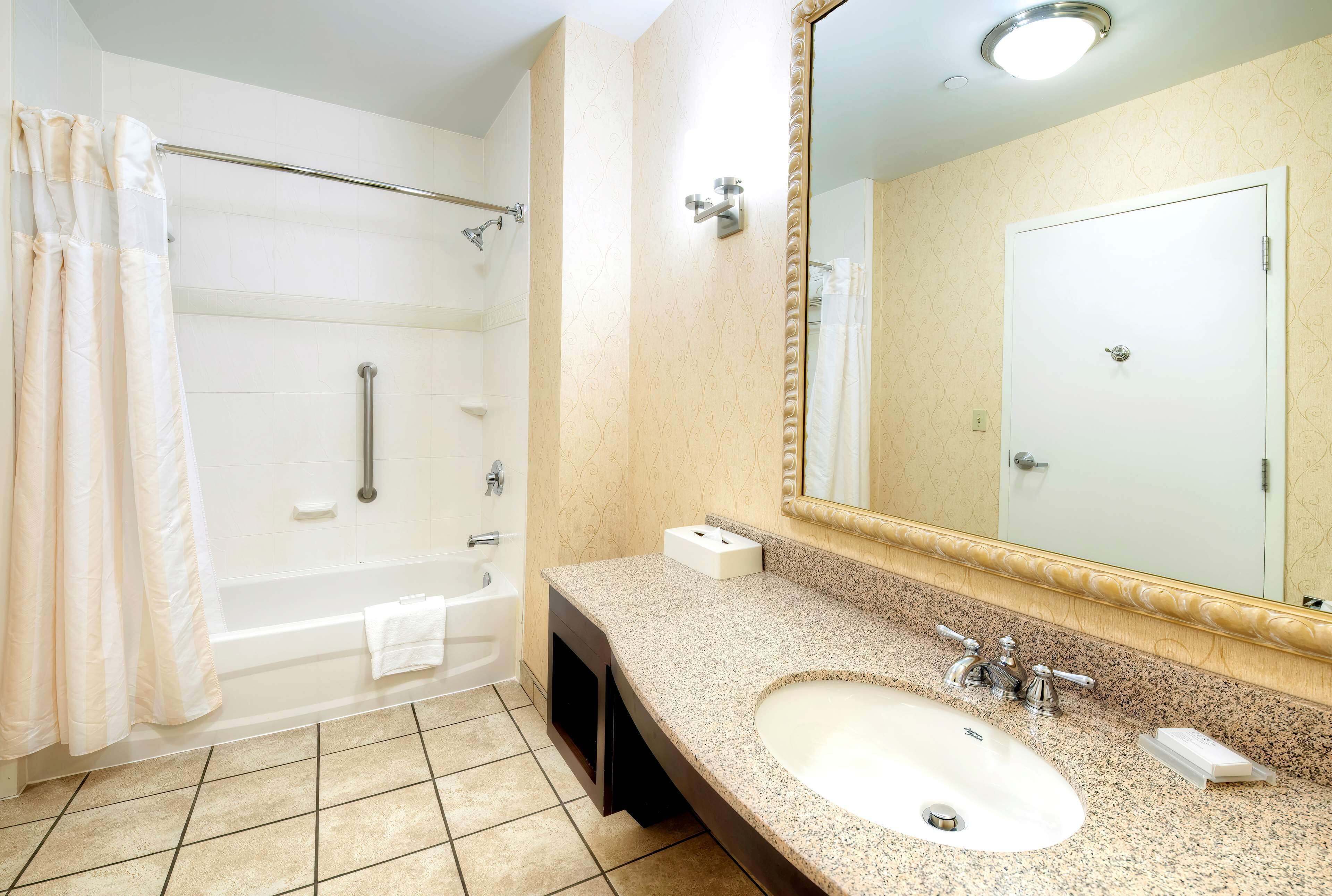 evolution, suite, 1 bedroom | bathroom | free toiletries, hair dryer, towels, soap
