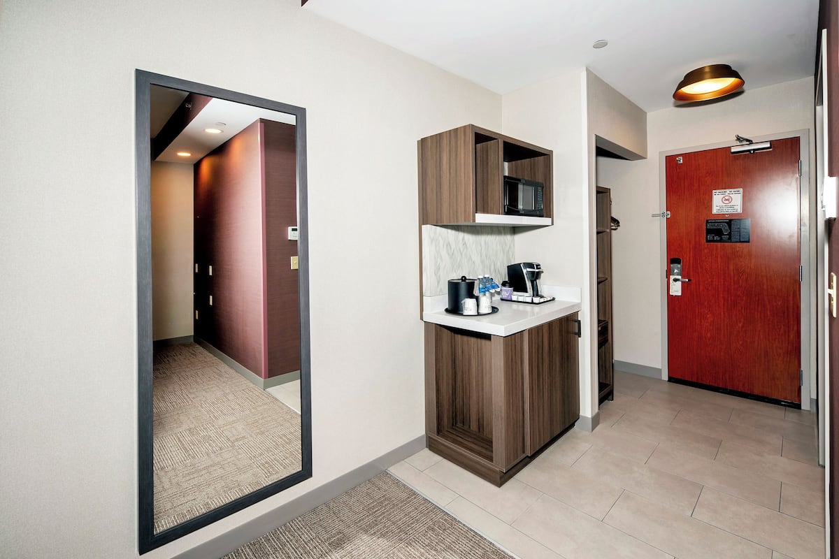 Down comforters, blackout drapes, soundproofing, iron/ironing board