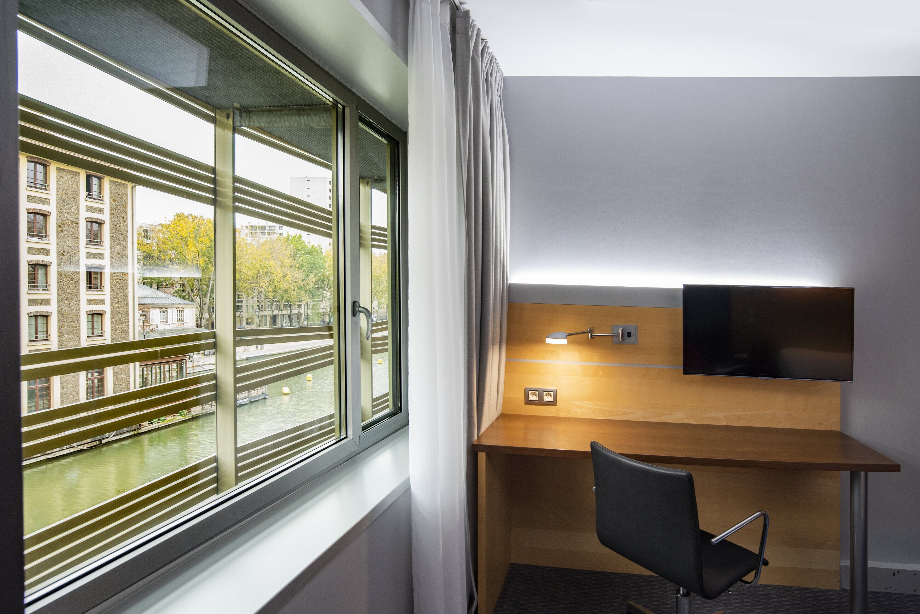 desk, blackout curtains, soundproofing, iron/ironing board