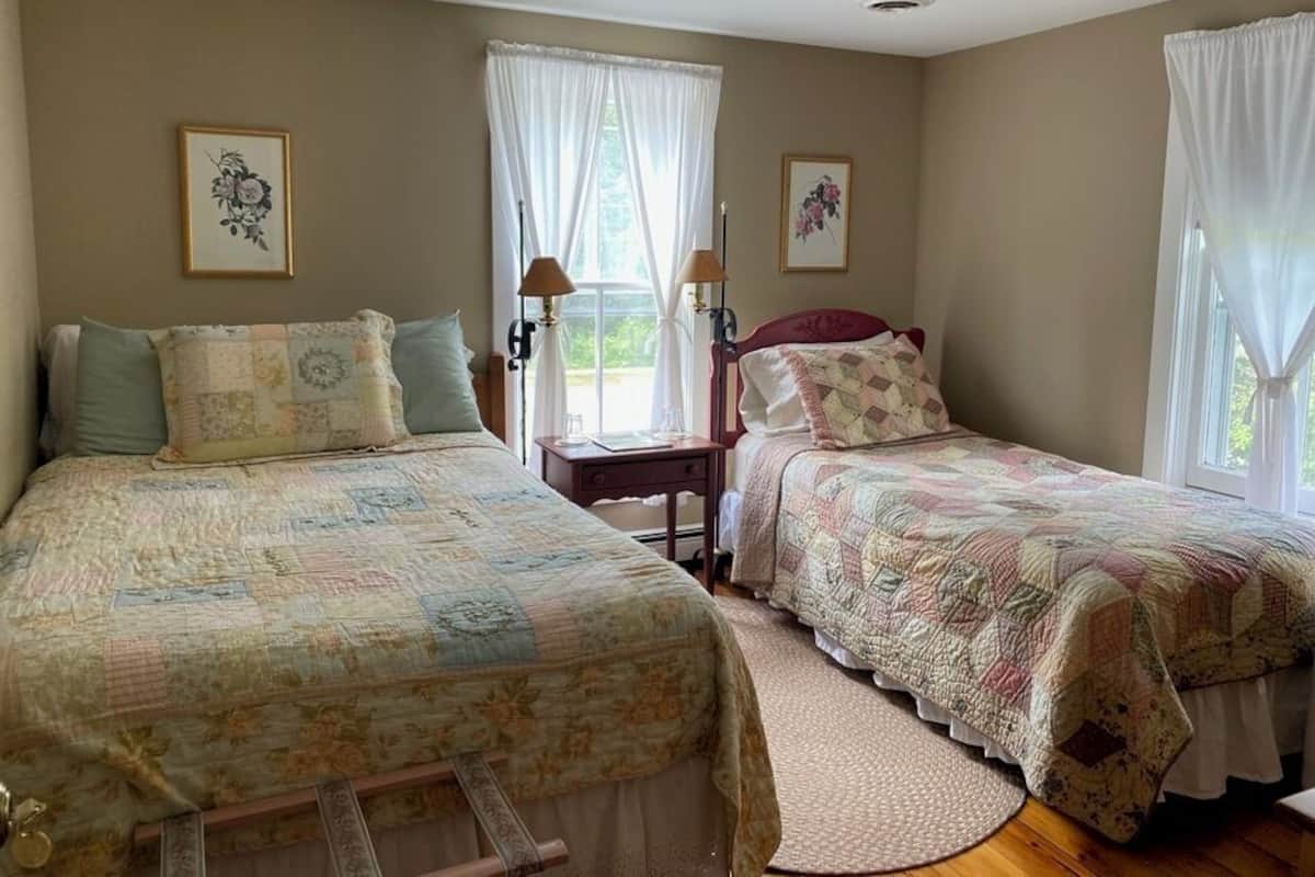 Triple Room, Multiple Beds, Shared Bathroom | Iron/ironing board, free WiFi, bed sheets