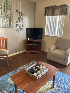 Suite Standard, 1 grand lit | Coin séjour