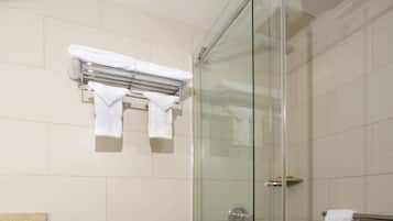 Shower, rainfall showerhead, designer toiletries, hair dryer