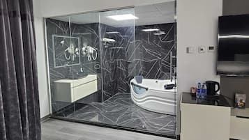 Shower, rainfall showerhead, free toiletries, hair dryer