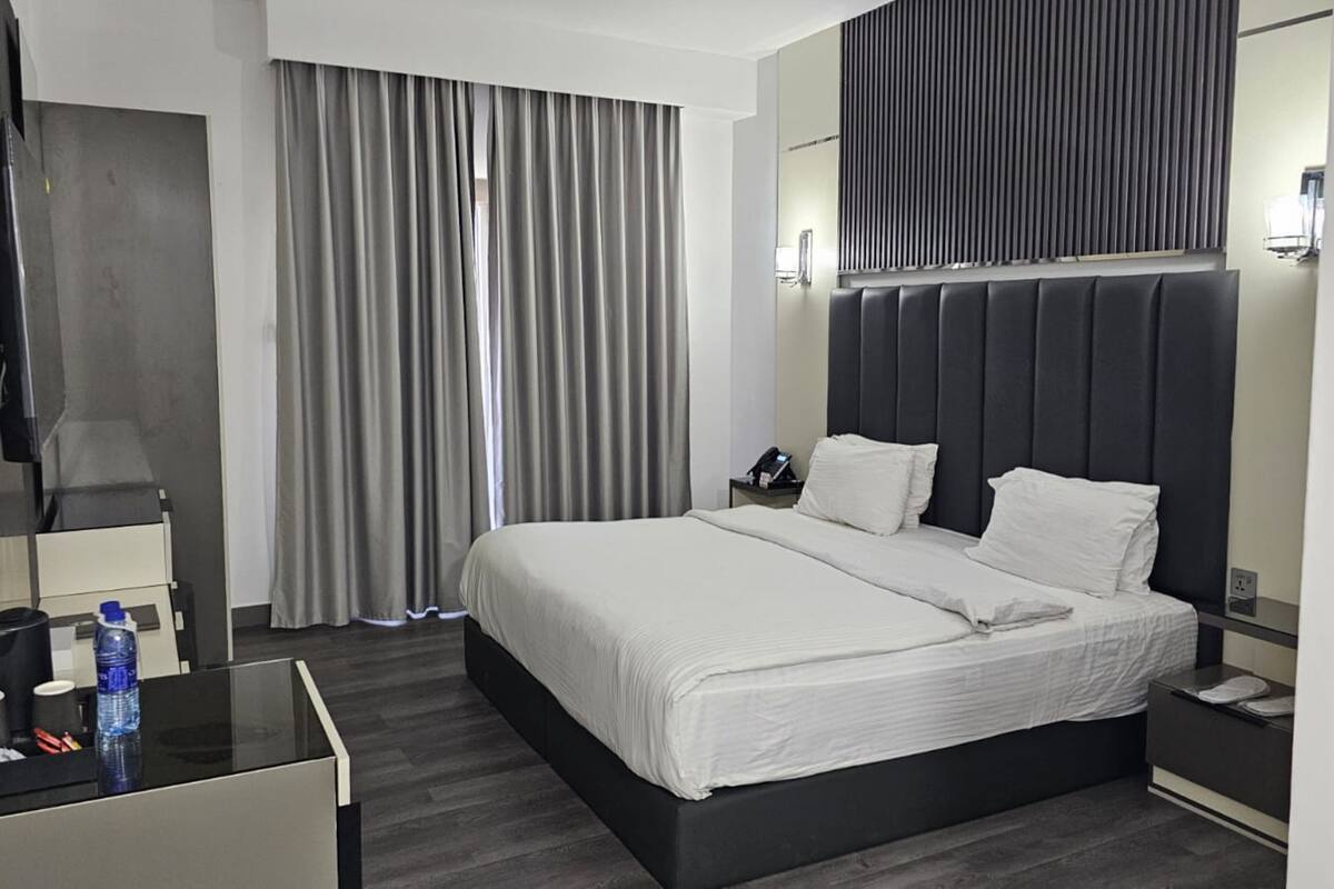 Down duvets, pillow-top beds, desk, laptop workspace