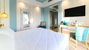 Suite – junior | Minibar, safe på rommet, skrivebord og lydisolert
