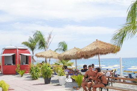Private beach nearby, white sand, sun-loungers, beach umbrellas. Afrodite Boutique Hotel