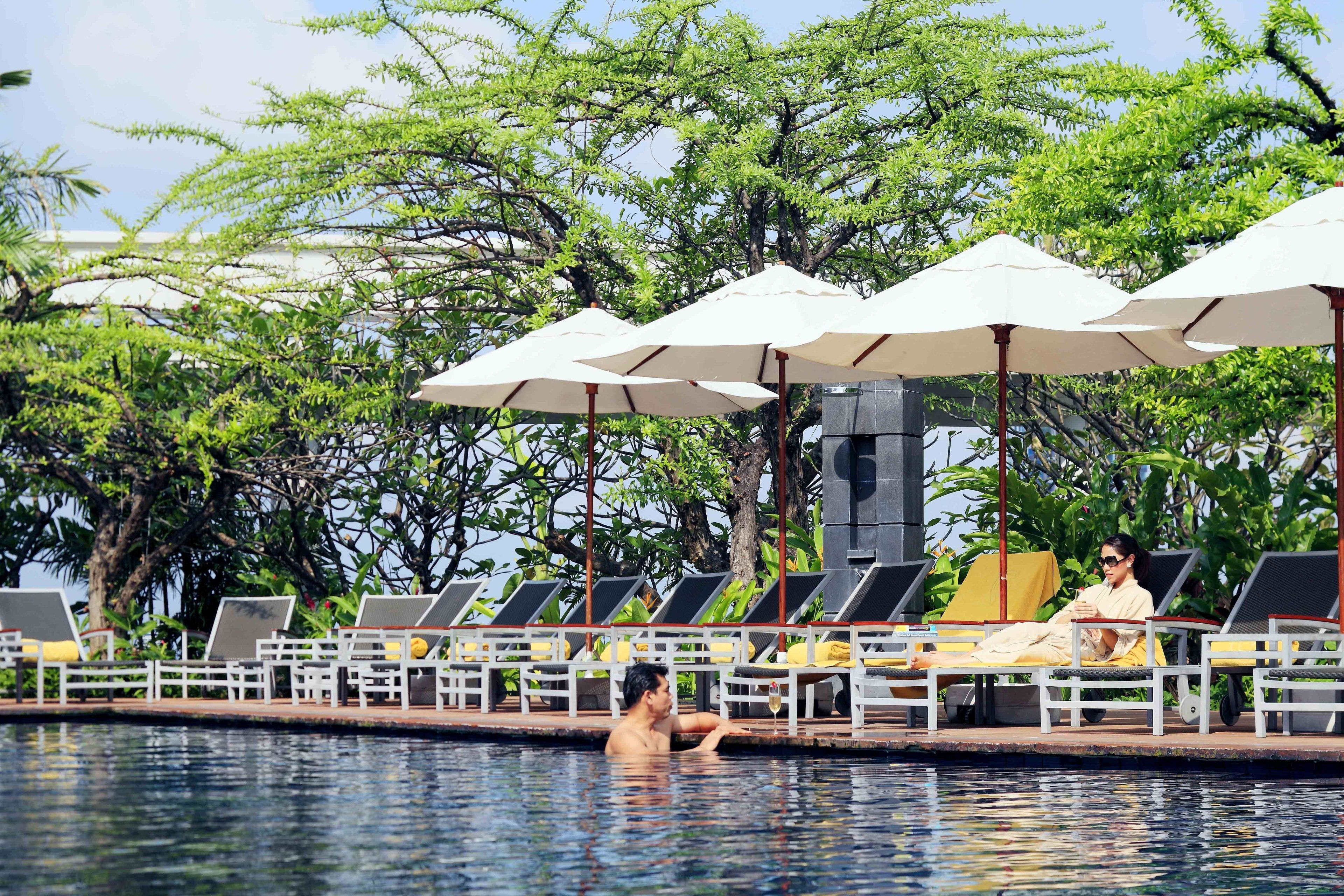 outdoor pool, pool umbrellas, pool loungers