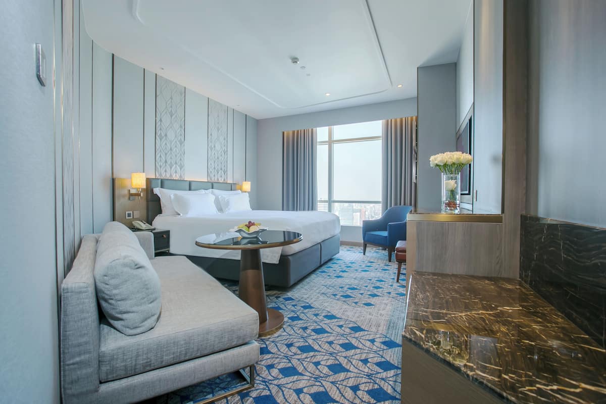 Deluxe Room, 1 King Bed | 1 bedroom, premium bedding, minibar, in-room safe