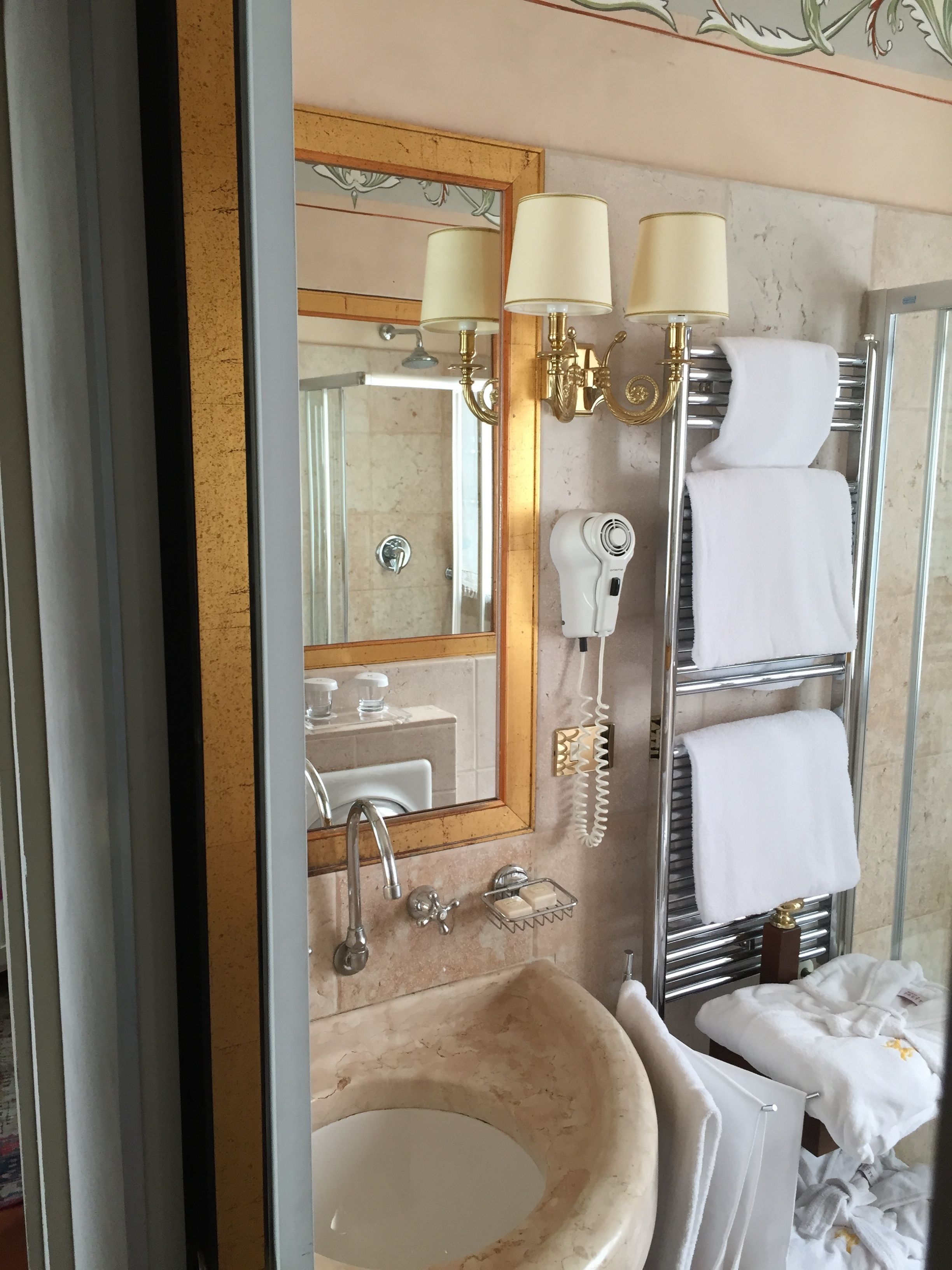 combined shower/bathtub, hair dryer, bathrobes, slippers