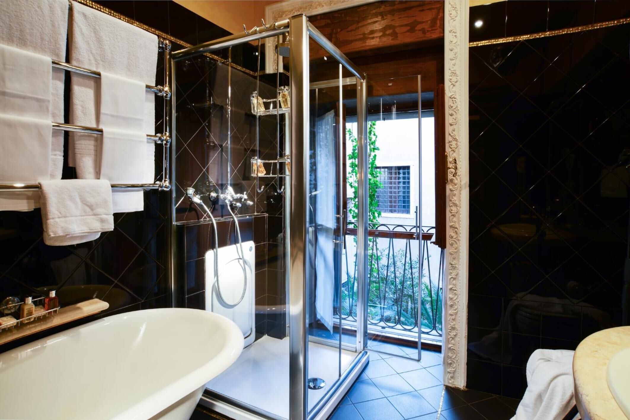 combined shower/bathtub, hair dryer, bathrobes, slippers