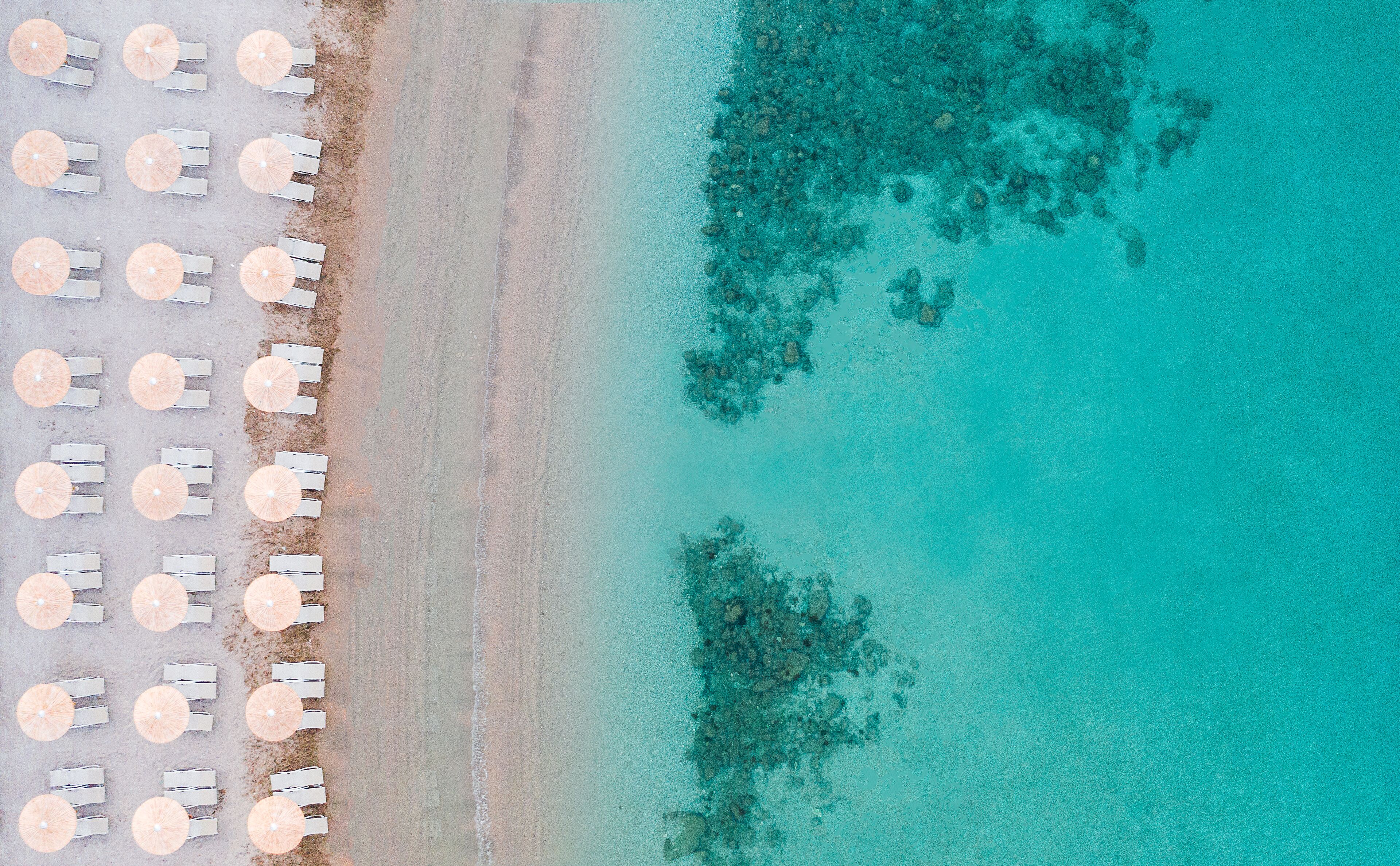 On the beach, sun loungers, beach umbrellas, beach towels