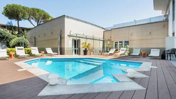 Seasonal outdoor pool, sun loungers