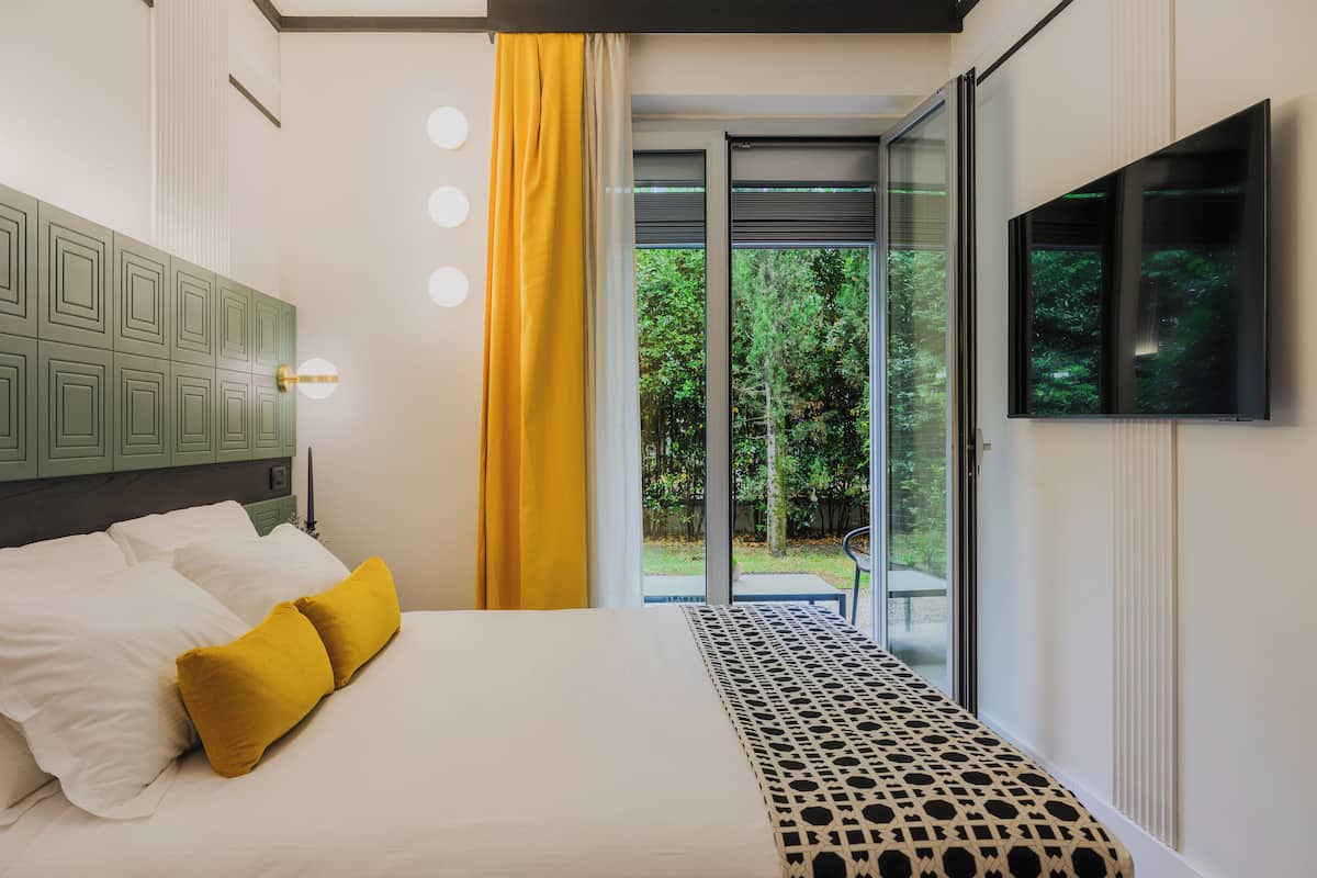 Hochwertige Bettwaren, Daunenbettdecken, Minibar, Zimmersafe