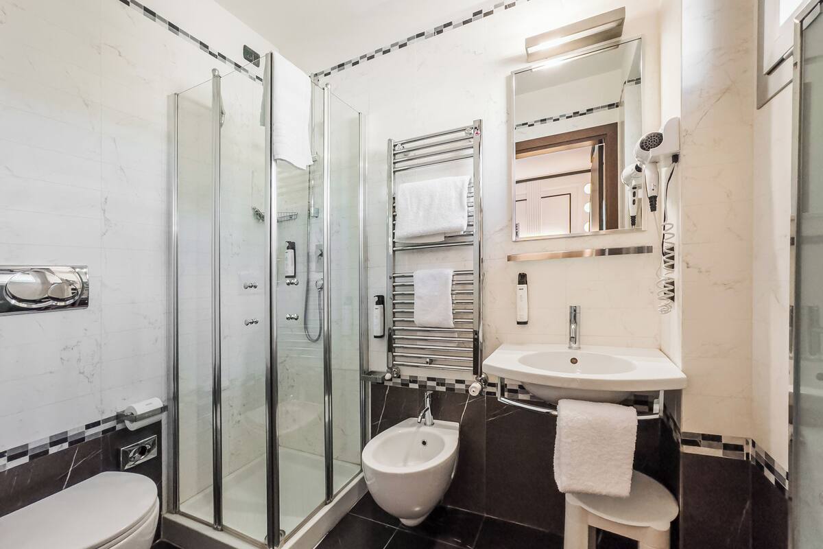 shower, free toiletries, hair dryer, slippers