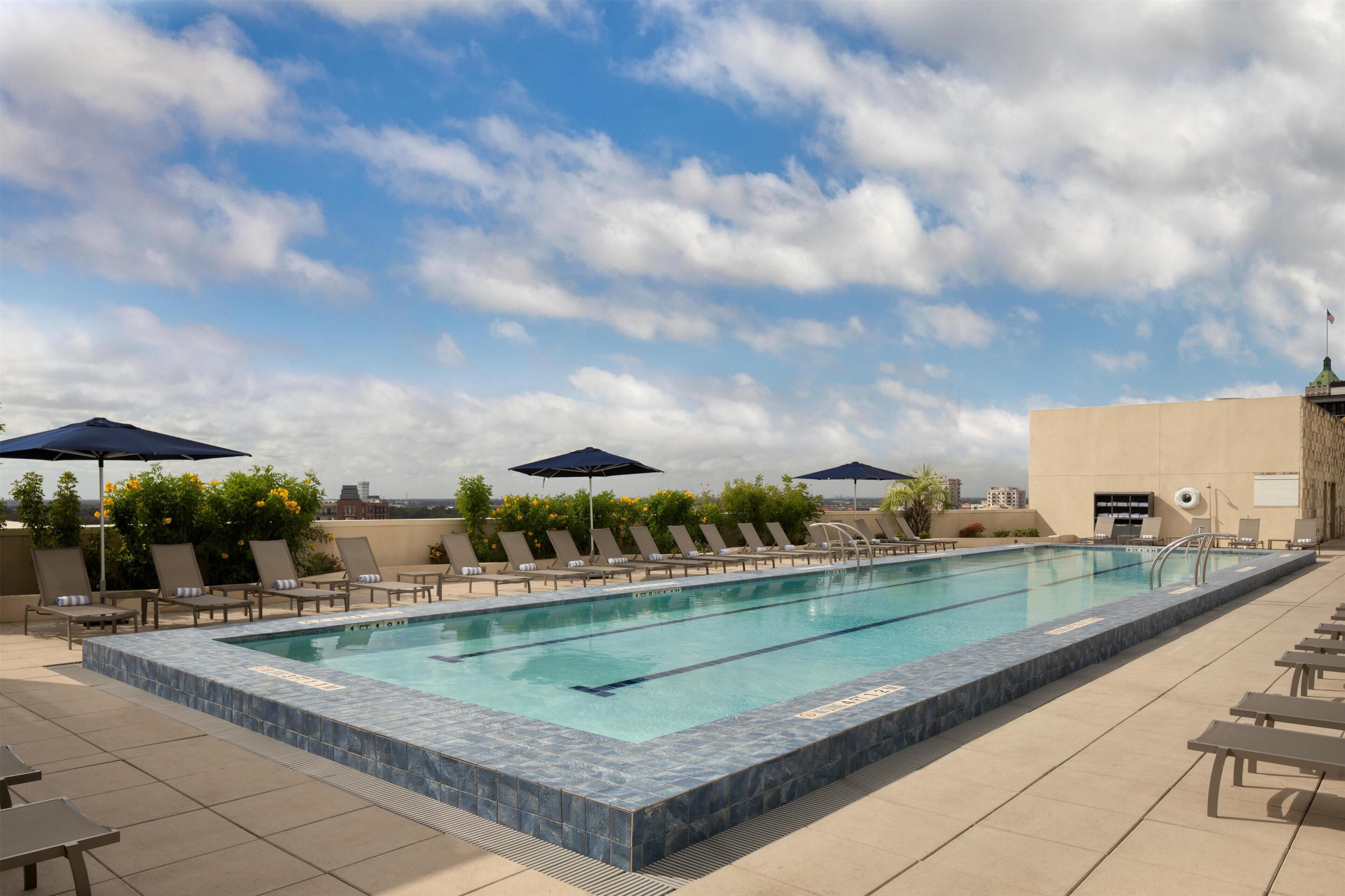 Outdoor pool, open 6:00 AM to 10:00 PM, sun loungers