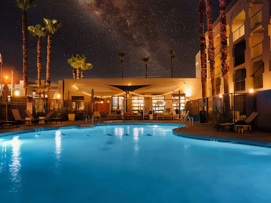 Outdoor pool, open 7:00 AM to 10:00 PM, free pool cabanas, pool loungers