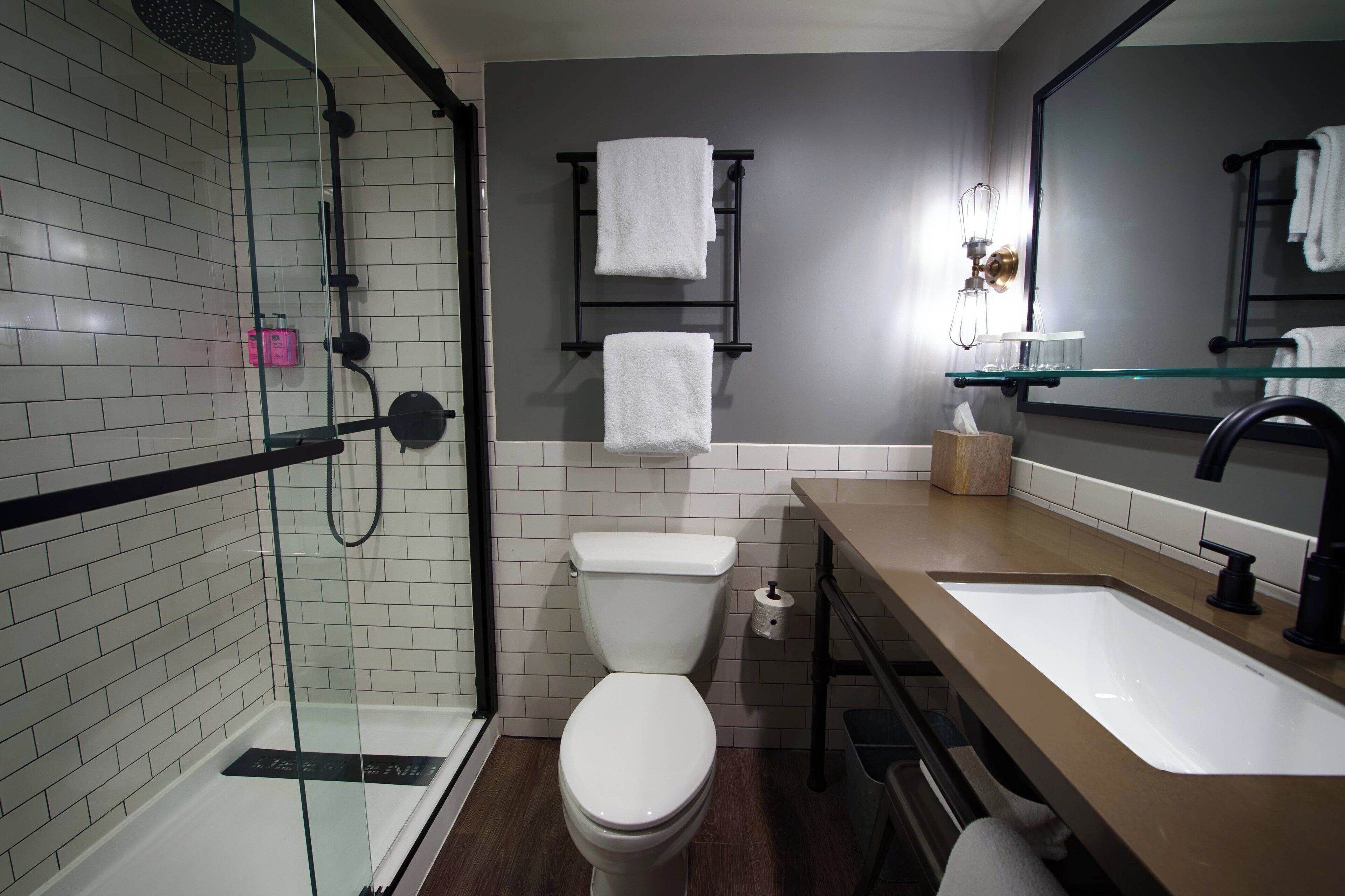 shower, rainfall showerhead, designer toiletries, hair dryer