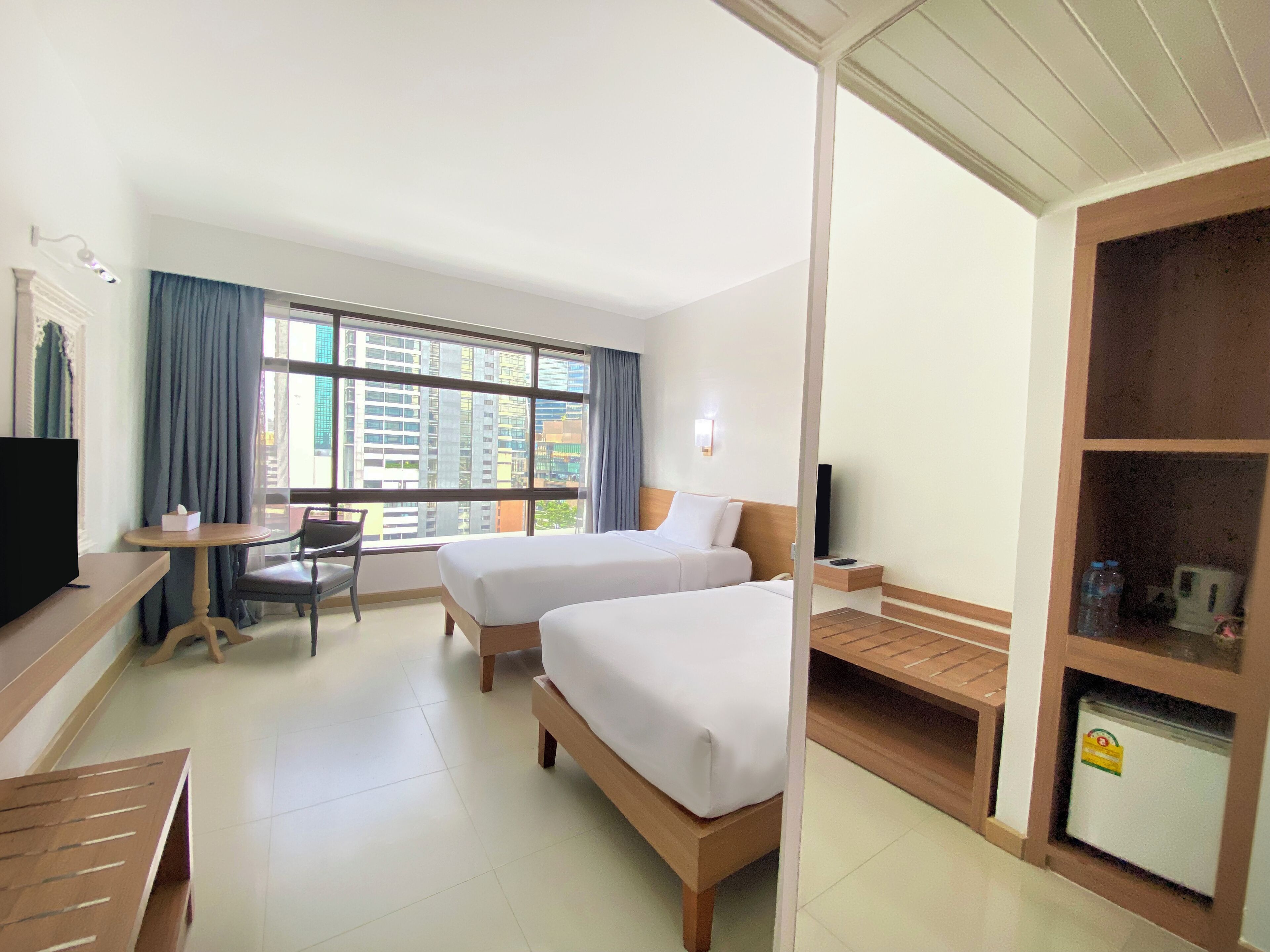 Deluxe Plus - Twin | Minibar, in-room safe, desk, free WiFi