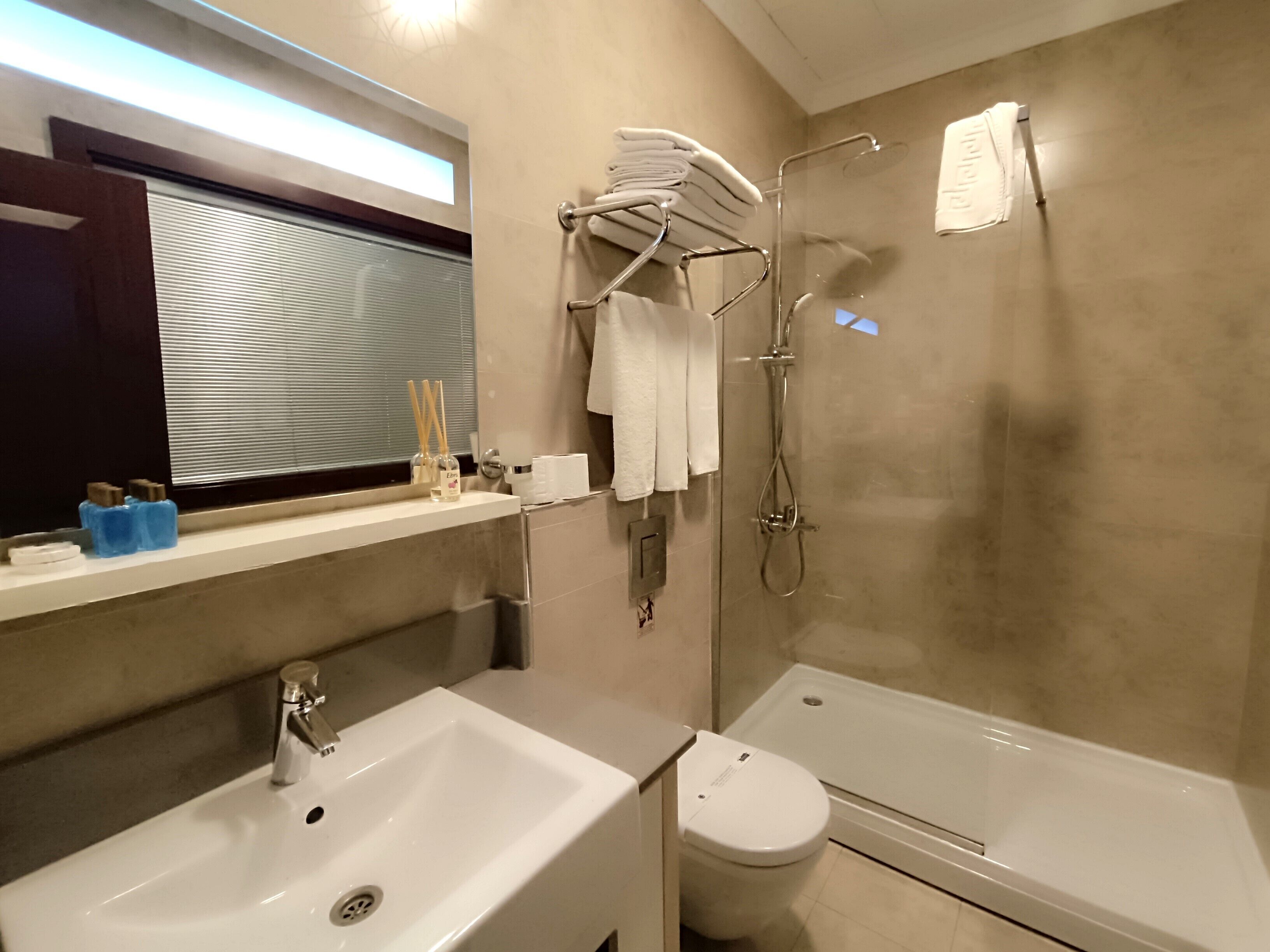 family suite, 1 bedroom, city view | bathroom | shower, rainfall showerhead, free toiletries, hair dryer